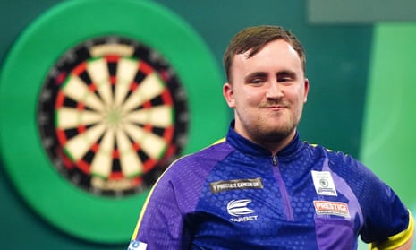Luke Littler smiles with delight after thrashing Rob Cross to reach the final in his debut PDC World Darts  Championship at Alexandra Palace.