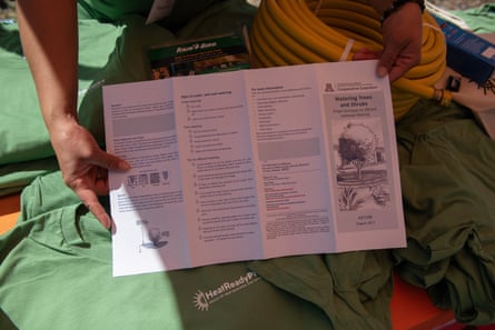 A person holding a pamphlet