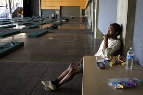 A man rests in the cooling center at Fisher Pavilion in the Seattle Center this week after experiencing symptoms of heat exhaustion.