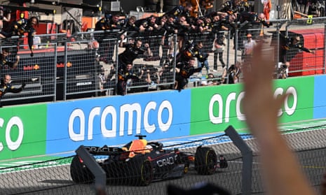 Red Bull Racing's Dutch driver Max Verstappen is cheered by teammates after winning the Formula One United States Grand Prix