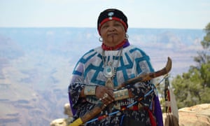 Dianna Sue White Dove Uqualla stands outside a lodge in Grand Canyon National Park.