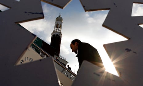 A man arrives at mosque for Friday prayers