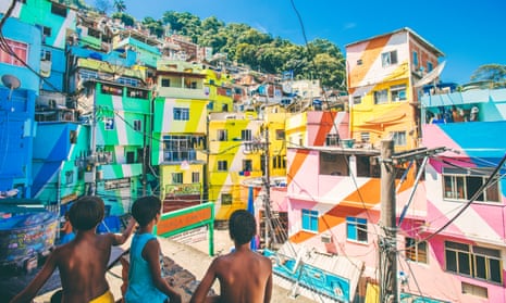 Boys playing with kites in a favela in Brazil