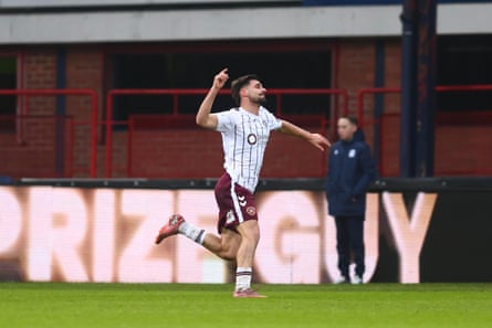 Cláudio Braga celebrates after scoring against Dundee
