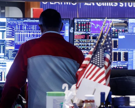 Traders work on the floor of the New York Stock Exchange