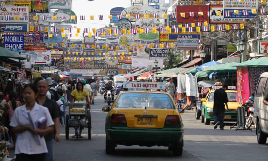 A canopy of signs: Khao San Road in Bangkok.