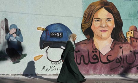 A mural of the slain Al-Jazeera journalist Shireen Abu Akleh who was shot dead during an Israeli military raid in the West Bank town of Jenin, adorns a wall in Gaza City.