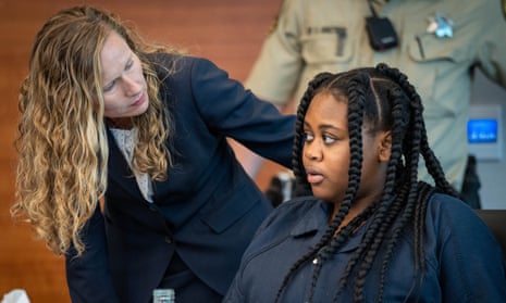 Pieper Lewis, right, speaks with her attorney Magdalena Reese during a sentencing hearing in Des Moines, Iowa.
