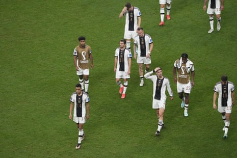 German players leaving the pitch and the World Cup yesterday.