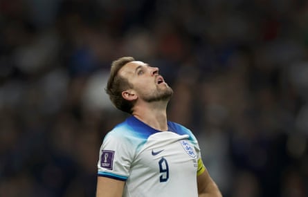 A dejected Harry Kane of England looks to the sky seconds before the referee blows the final whistle during the FIFA World Cup 2022 quarter-final match between England and France at the Al Bayt Stadium on December 10th 2022 in Doha, Qatar.