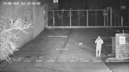 Screengrab from CCTV showing Simon Levy walking away from a gated car park