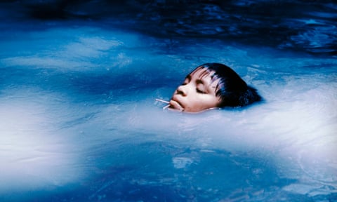Boy's face poking out of water