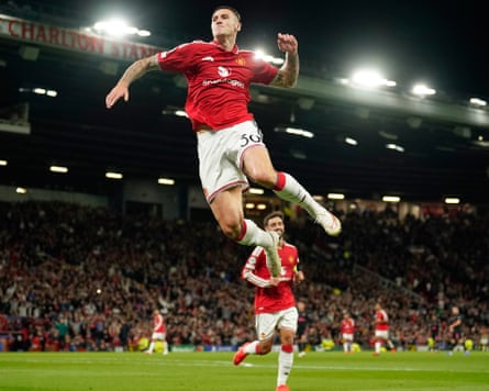 Benjamin Sesko leaps in the air as he celebrates scoring