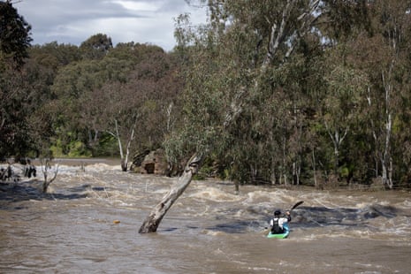 Georgia O’Callaghan in her slalom kayak tackles the high water levels on the Yarra River at Dights Falls in Abbotsford.