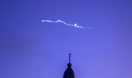 Traces of missiles are seen after Iran launched missile strike on Israel on Tuesday.