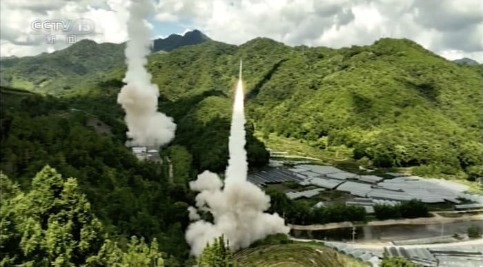 More missiles are shown launching from an unspecified location.