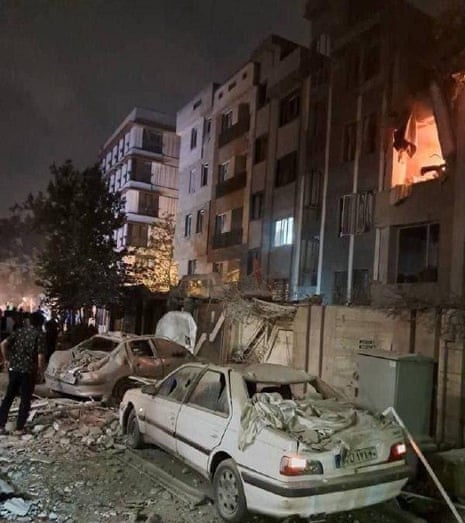 A handout photo made available by the Islamic Revolutionary Guard Corps (IRGC) telegram channel shows a building on fire.