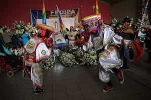 Performers do the scissor dance during the wake for Sotelo