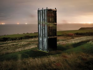 The cage near the site where the Easington colliery once stood. This is the metal box that transported miners into the bowels of the earth and is now a memorial to the mine that gave the village its name. Easington colliery, County Durham, November 2020