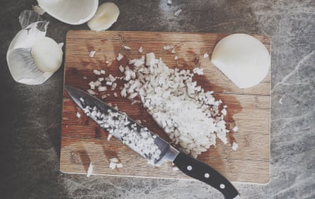 Chopping onions.