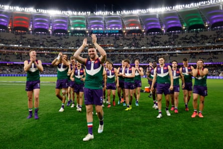 Luke Ryan applauds fans as the Dockers leave the Optus Stadium pitch after victory over Adelaide.