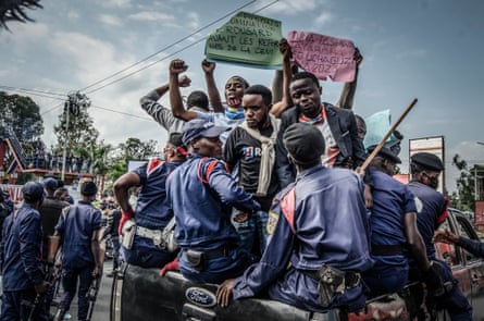 Protesters are arrested by police in the eastern city of Goma on 13 July while denouncing the nomination of an election commission chief accused of rigging past elections in favour of former president Joseph Kabila.