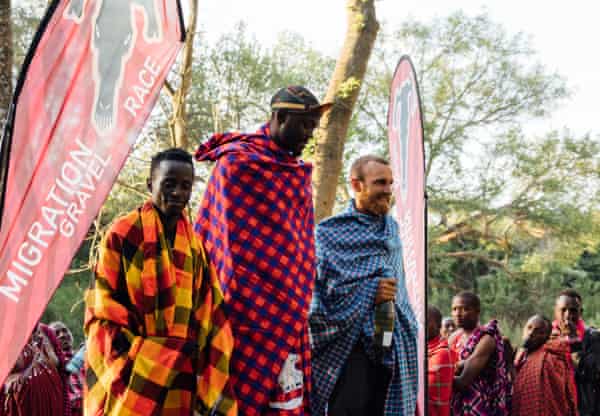 John Kariuki of team Amani stands on the winner's stand at the 2022 Migration Gravel Race.