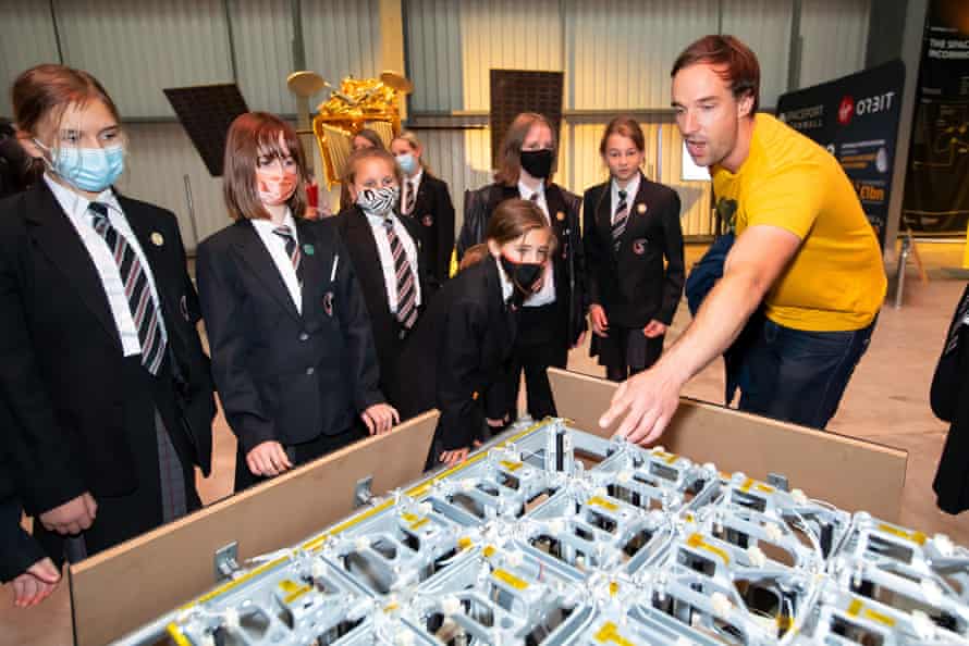 Dave Pollard, Spaceport Cornwall’s outreach manager, talks to a group of school children about a device which can dispatch individual satellites into differing orbits.