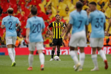 Watford captain Troy Deeney looks dejected after Manchester City’s sixth goal.