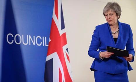 Theresa May gives a press conference in Brussels.