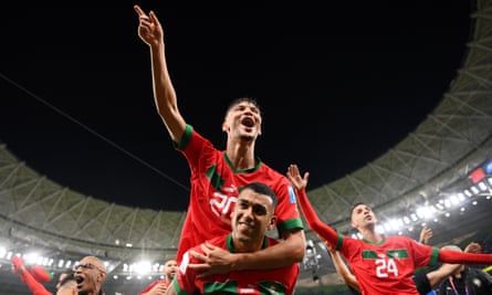 Achraf Dari and Walid Cheddira of Morocco celebrate the team’s 1-0 victory over Portugal in the World Cup quarter final.