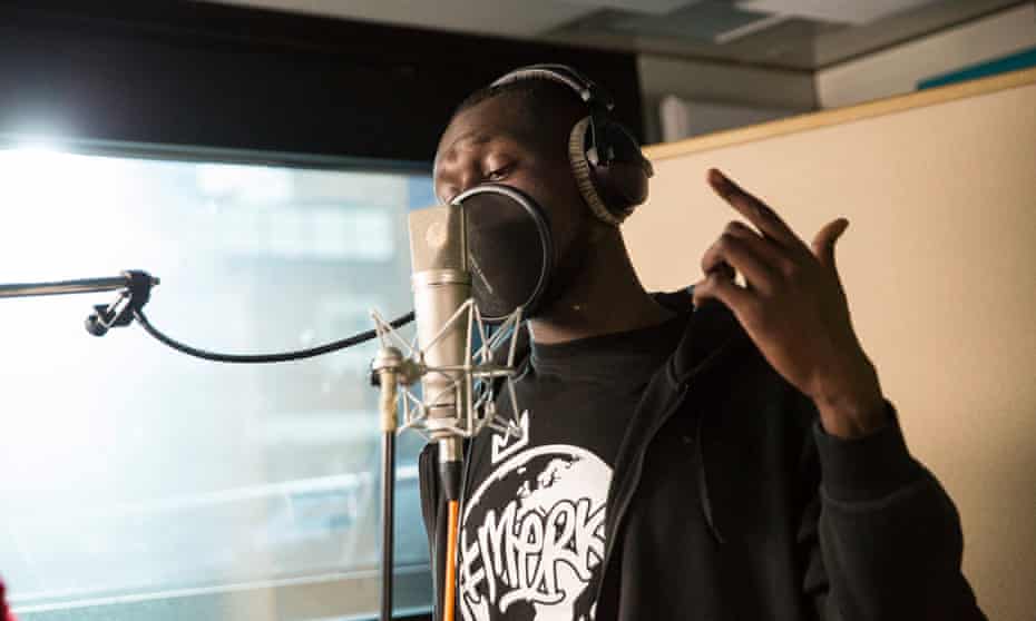 Stormzy recording the charity single for Grenfell Tower.