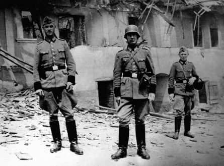 Schutzpolizei Nazi police pose among the ruins of Lidice.