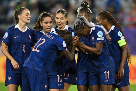 France's Kadidiatou Diani (no 11) celebrates scoring the 2-1 goal with her teammates.