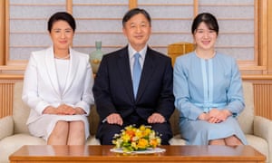 Japan’s Emperor Naruhito (C), Empress Masako (L) and their daughter Princess Aiko (R) at the Imperial Palace in Tokyo.