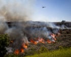 Aerial footage shows California brush fire spreading across Simi Valley – video