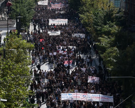 Thousands march in Greece over public education failures as Macron blasts ‘stupid’ commentary on French protests – as it happened