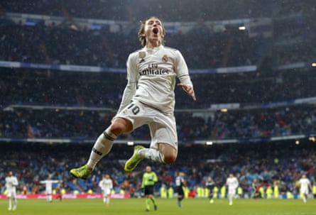 Luka Modric celebrates sealing Real Madrid’s La Liga victory over Sevilla.