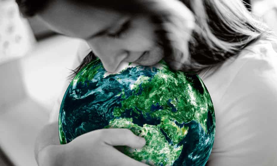 Woman cradling the globe