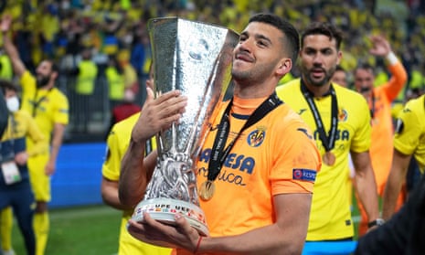 Villarreal's Gerónimo Rulli with the Europa League trophy after the victory over Manchester United.