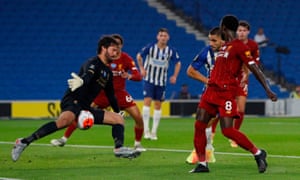 Brighton’s Neal Maupay is thwarted by Liverpool’s goalkeeper Alisson Becker.