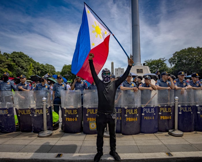 ‘She died because of the flood’: Filipinos rise up as outrage over corruption scandal grows
