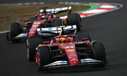 Lewis Hamilton leading Charles Leclerc early in the race