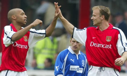 Thierry Henry and Dennis Bergkamp celebrate Henry’s goal against Everton at Highbury in May 2002