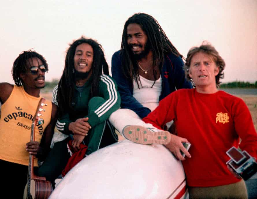 Chris Blackwell with (l-r) Junior Marvin, Bob Marley & Jacob Miller, en route to Brazil, 1980