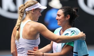 Ons Jabeur embraces Caroline Wozniacki