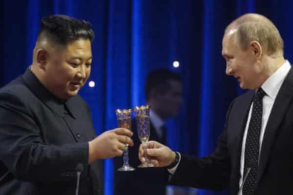 Kim Jong-un and Vladimir Putin toast their summit in Vladivostok in 2019.