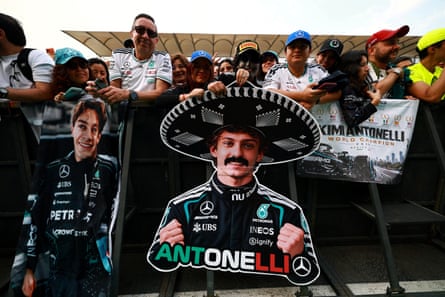 Fans with cardboard cutouts of Kimi Antonelli ahead of the Mexico City Grand Prix