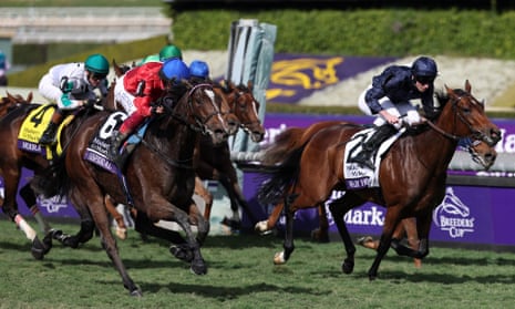 Inspiral (6), with jockey Frankie Dettori up, wins the Breeders Cup Filly and Mare Turf.