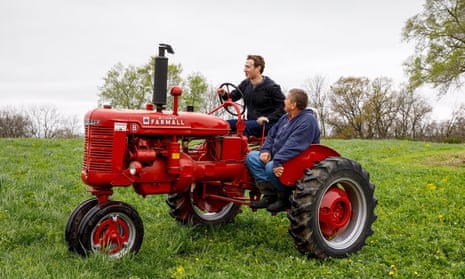 Mark Zuckerberg riding a tractor